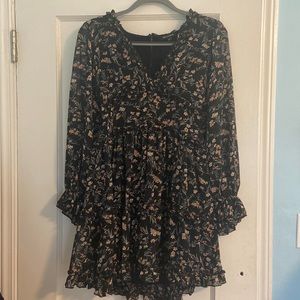 Small long sleeved flower print cocktail dress